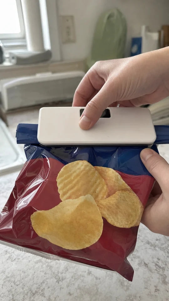 Customer sealing a snack bag with SealMate
